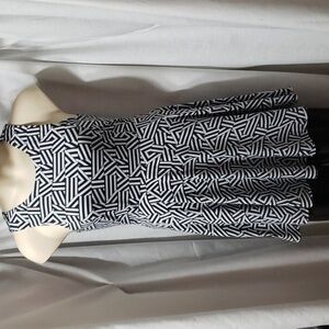 Love Fire. Black & White Dress; Knee Length; Sleeveless; Swing Hem. EUC. Size M